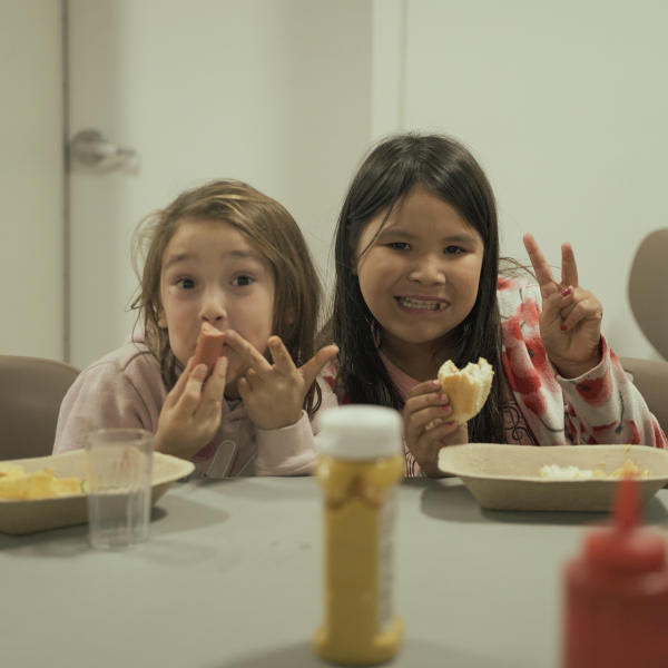 Two girls with bread